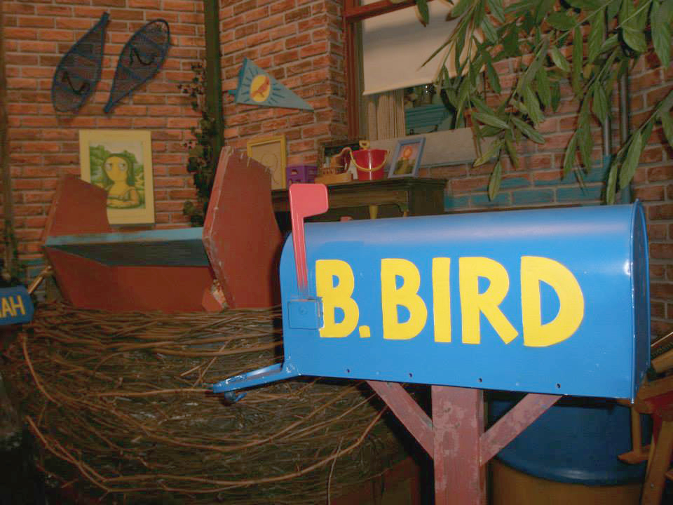 image of blue mailbox stenciled B.Bird